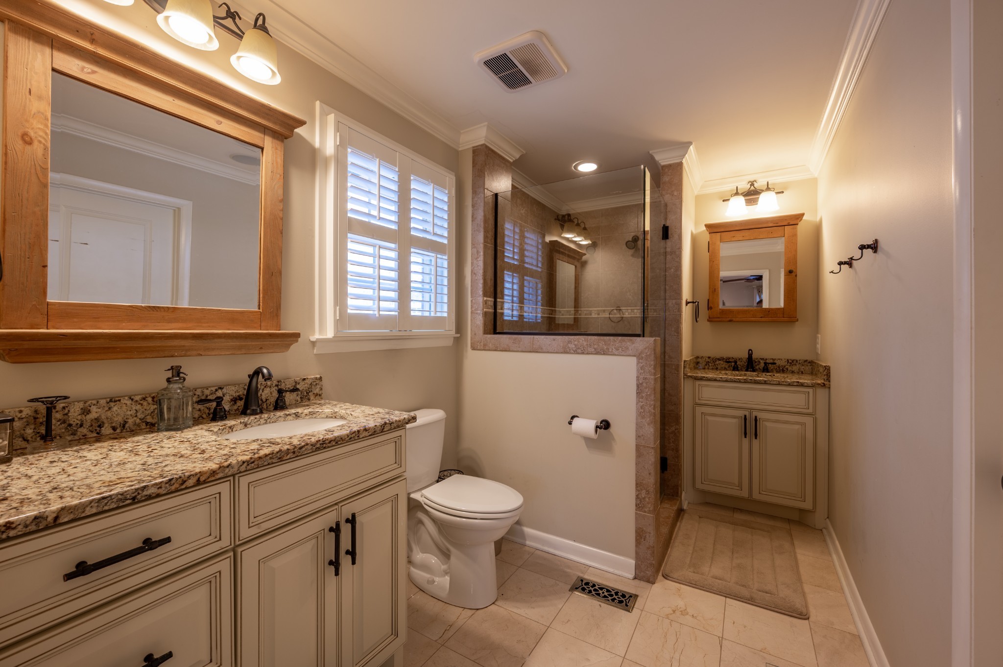 1208 Davidson Road Nashville, TN 37205 - Photo 18 of 30 a bathroom with a granite countertop sink toilet and shower