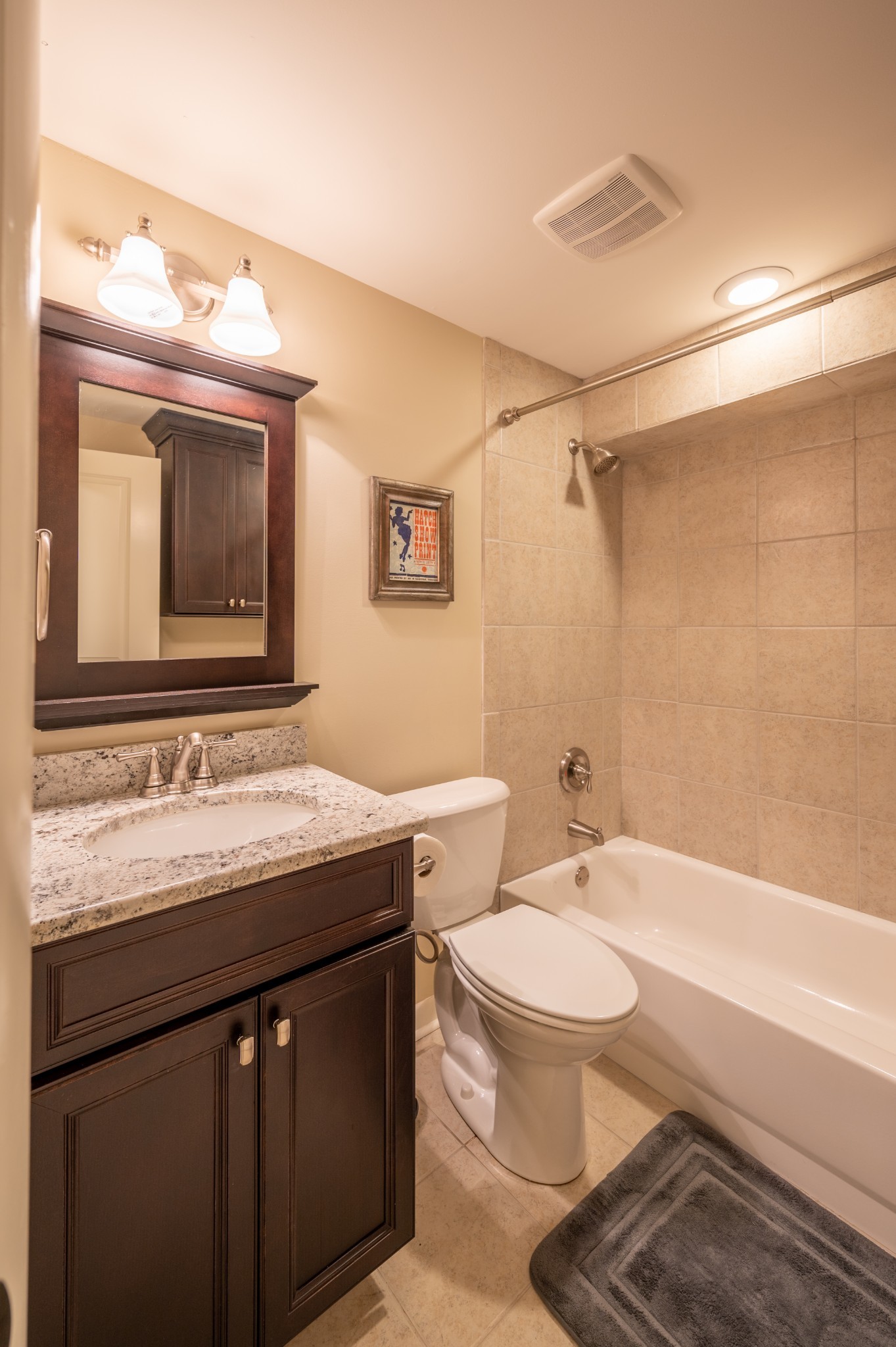 1208 Davidson Road Nashville, TN 37205 - Photo 25 of 30 a bathroom with a sink a toilet a mirror and shower