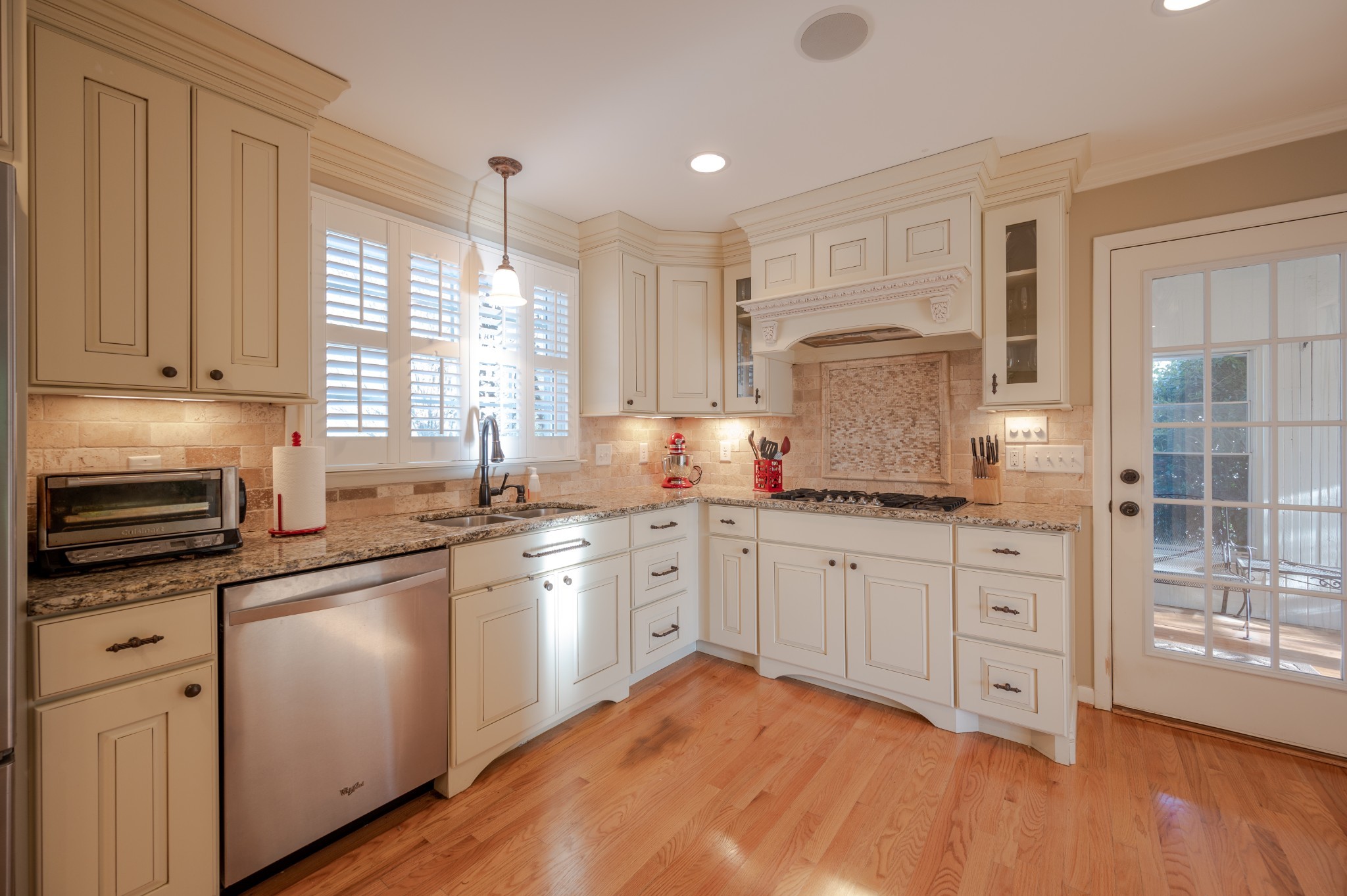 1208 Davidson Road Nashville, TN 37205 - Photo 8 of 30 a kitchen with granite countertop white cabinets white appliances a sink and a window