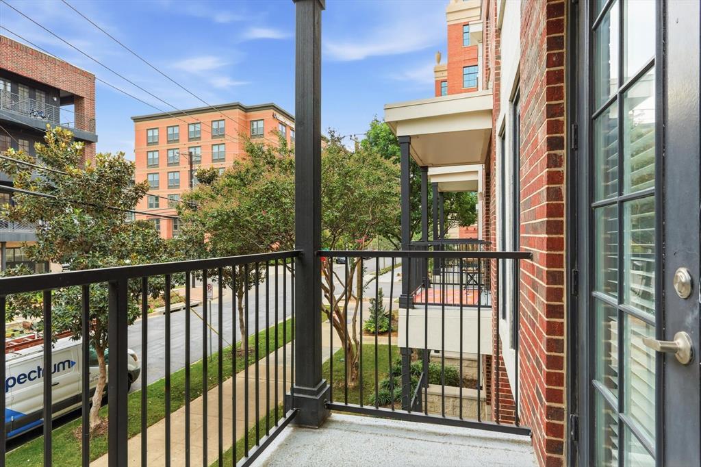 4110 Fairmount Street, Unit 1005 Dallas, TX 75219 - Photo 20 of 35 a view of a building from a balcony
