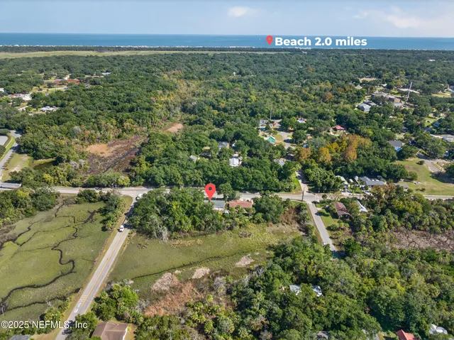 a kitchen with stainless steel appliances granite countertop a refrigerator stove microwave and sink