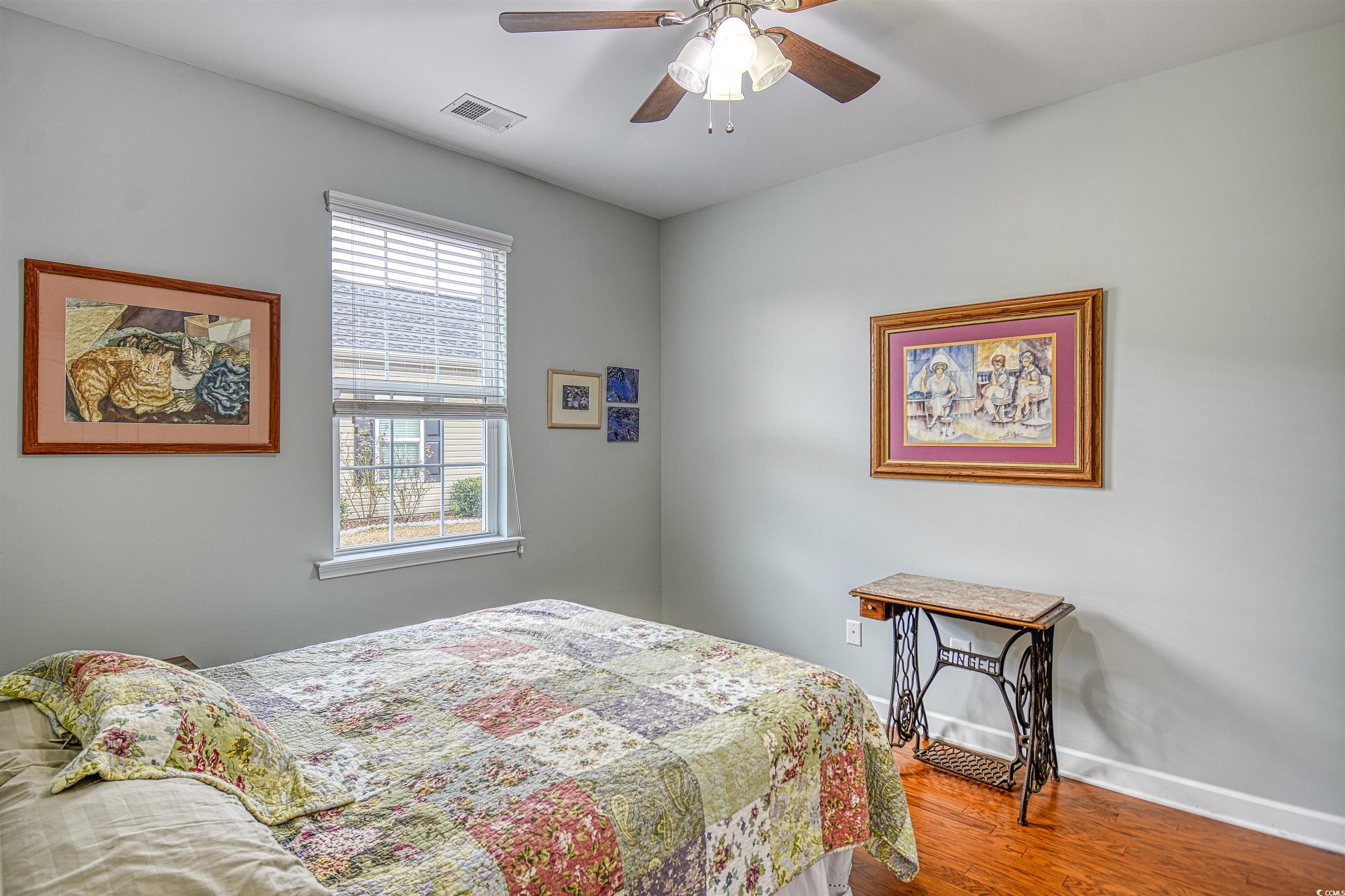 293 Ridge Point Drive Conway, SC 29526 - Photo 23 of 36 Bedroom featuring ceiling fan and hardwood / wood-