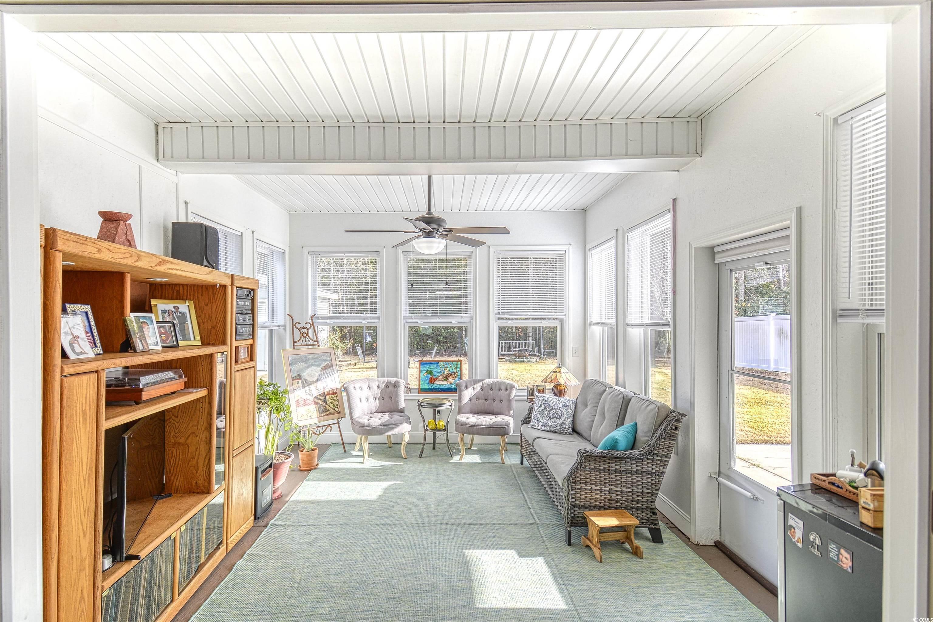 293 Ridge Point Drive Conway, SC 29526 - Photo 7 of 36 Sunroom featuring beamed ceiling and ceiling fan