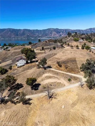 a view of a yard covered in snow