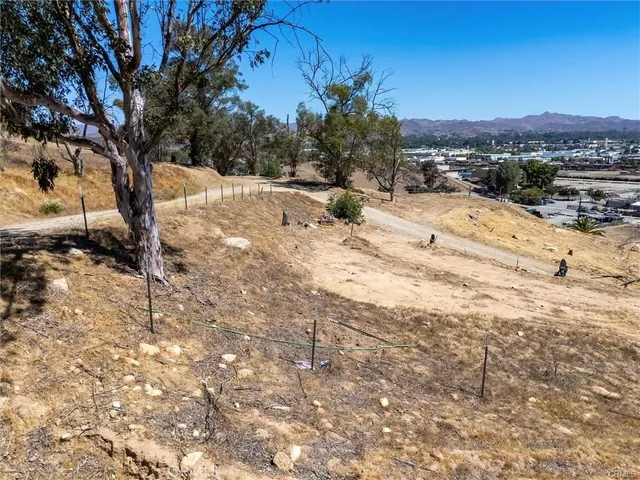 a view of backyard of a house