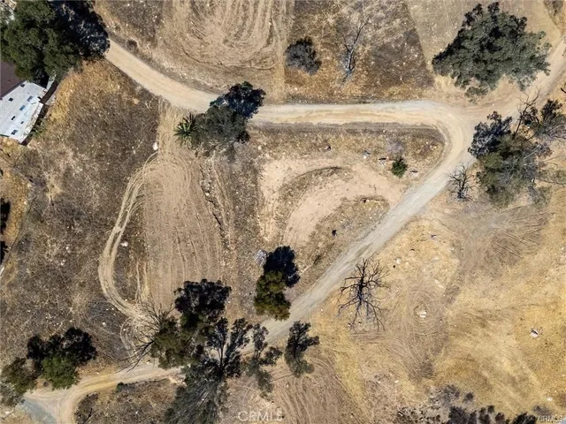 a view of water heater of a yard with a house