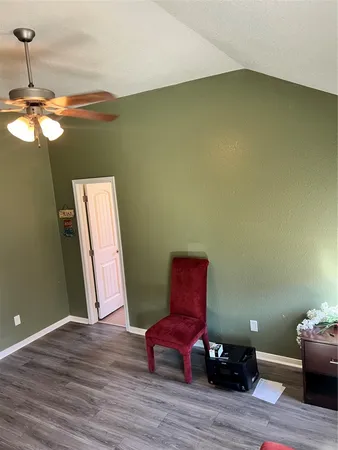 a room with furniture and a chair