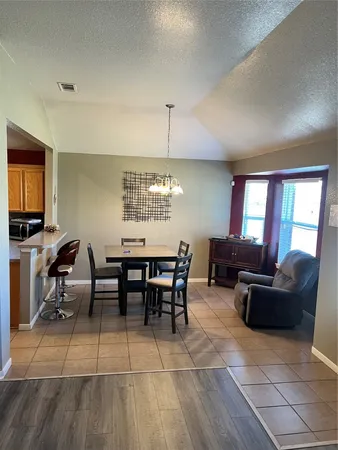 a view of a livingroom with furniture window and outside view