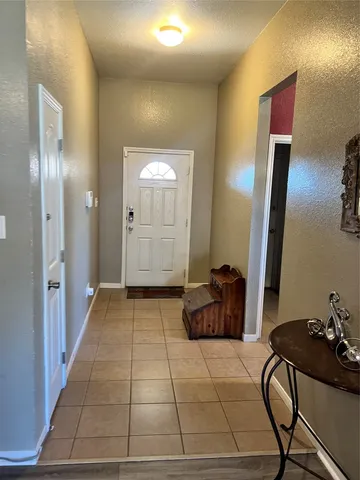 a room with furniture and a mirror