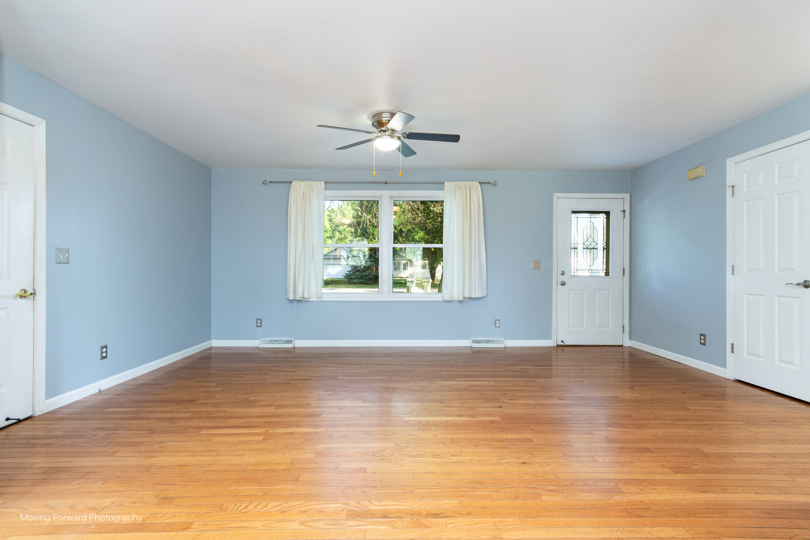 1907 Irene Road Sandwich, IL 60548 - Photo 5 of 25 wooden floor in an empty room with a window