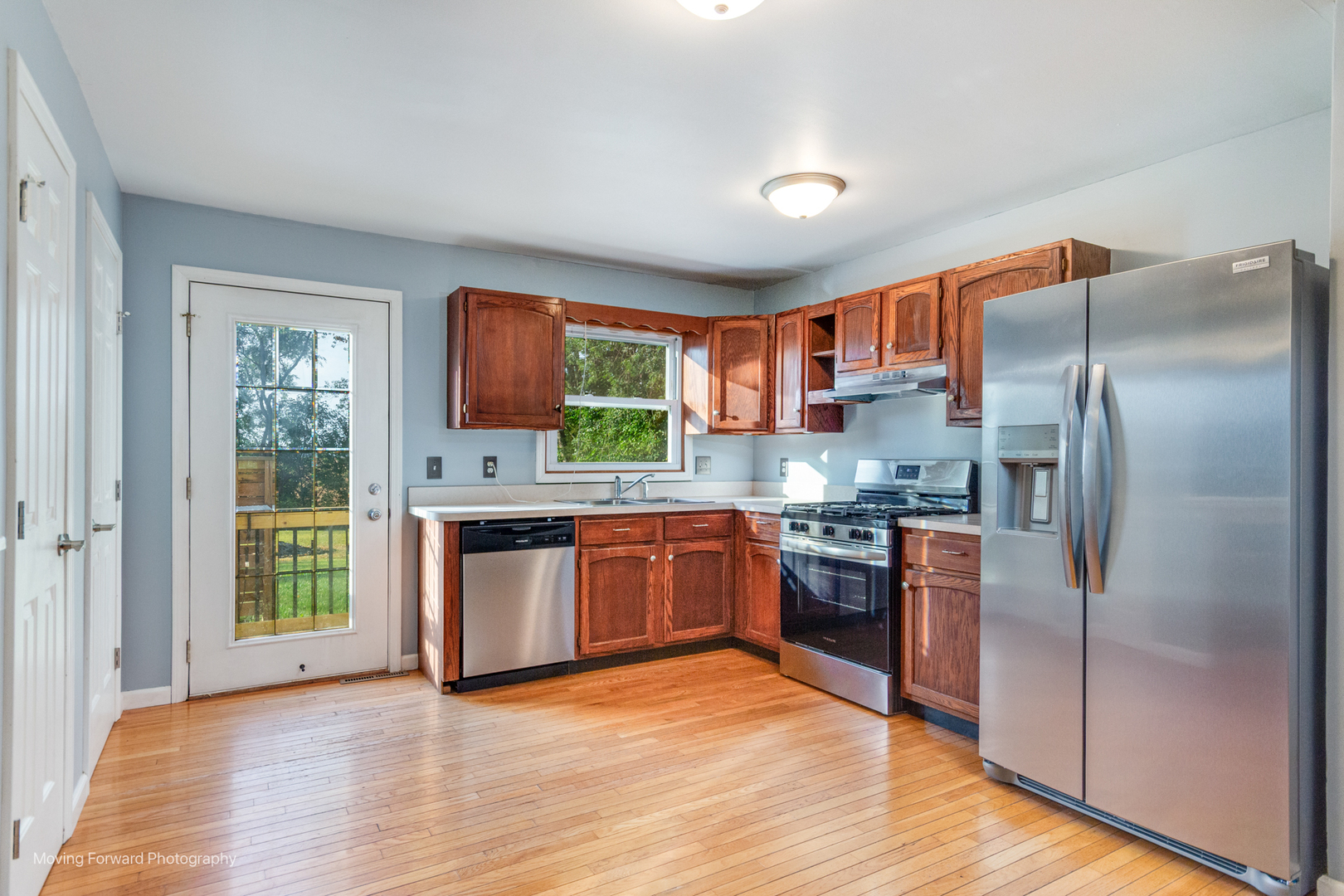 1907 Irene Road Sandwich, IL 60548 - Photo 6 of 25 a kitchen with stainless steel appliances granite countertop a refrigerator and a stove top oven