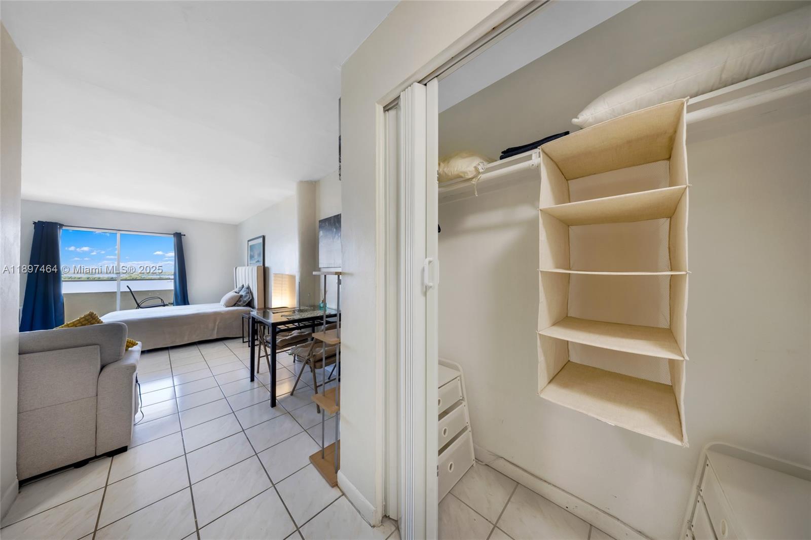 7904 West Drive, Unit 1010 North Bay Village, FL 33141 - Photo 12 of 25 a view of kitchen and living room