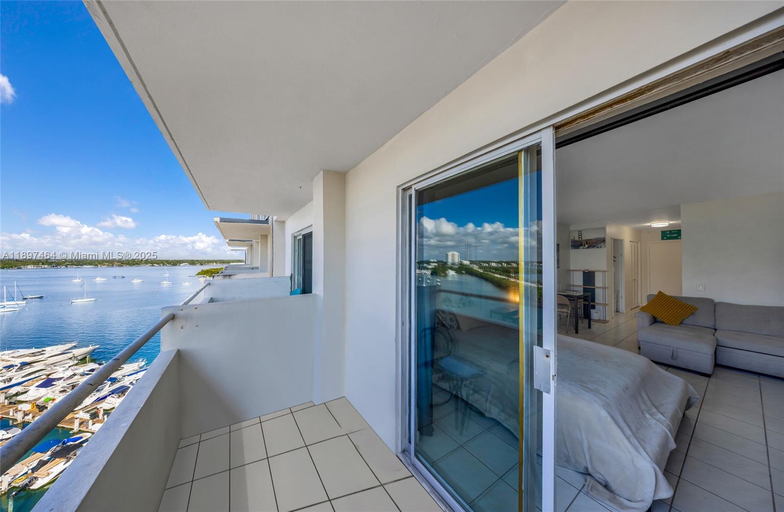 7904 West Drive, Unit 1010 North Bay Village, FL 33141 - Photo 19 of 25 a hallway with dining room and livingroom view