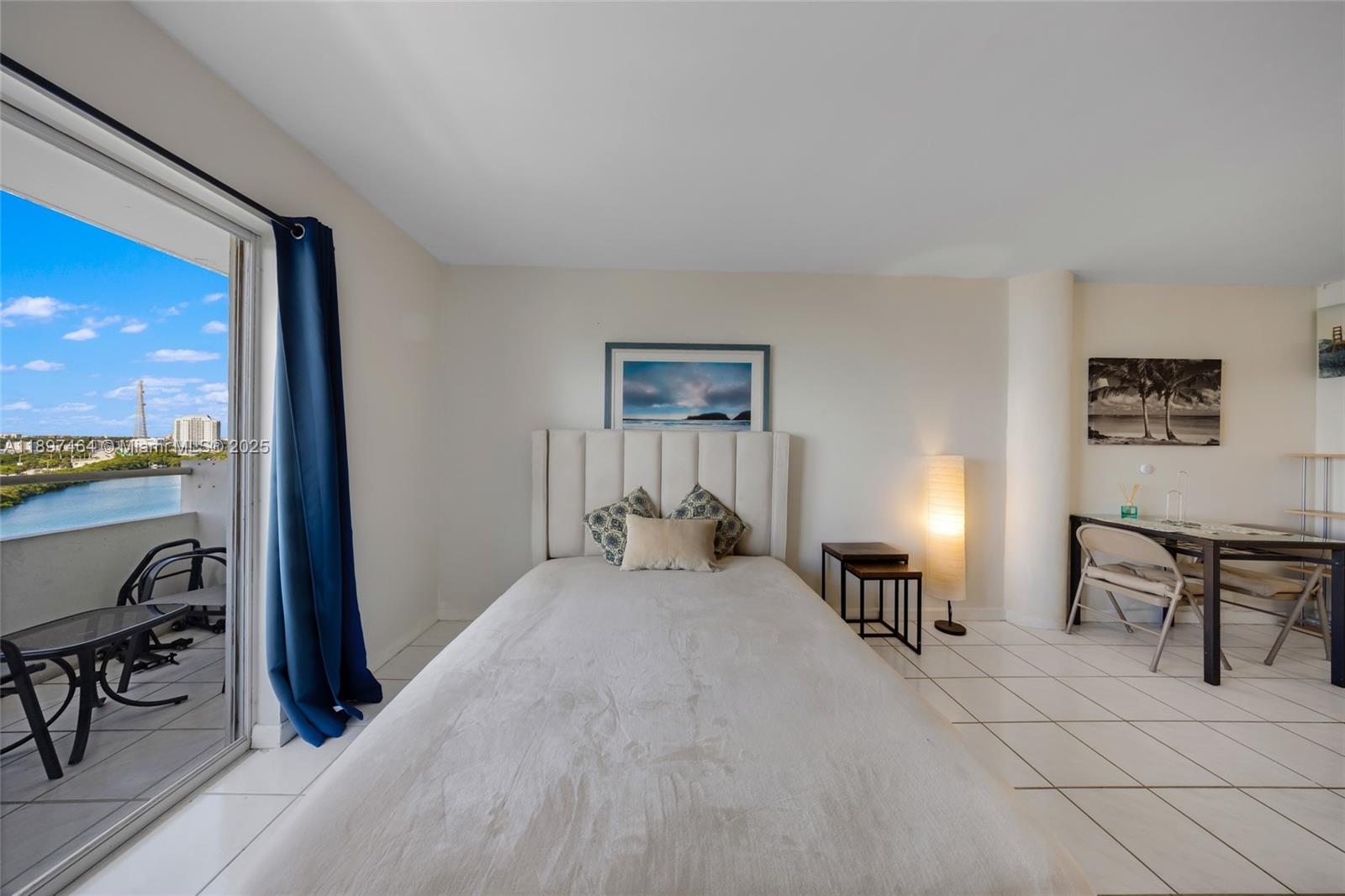 7904 West Drive, Unit 1010 North Bay Village, FL 33141 - Photo 4 of 25 a view of a livingroom with furniture and a window