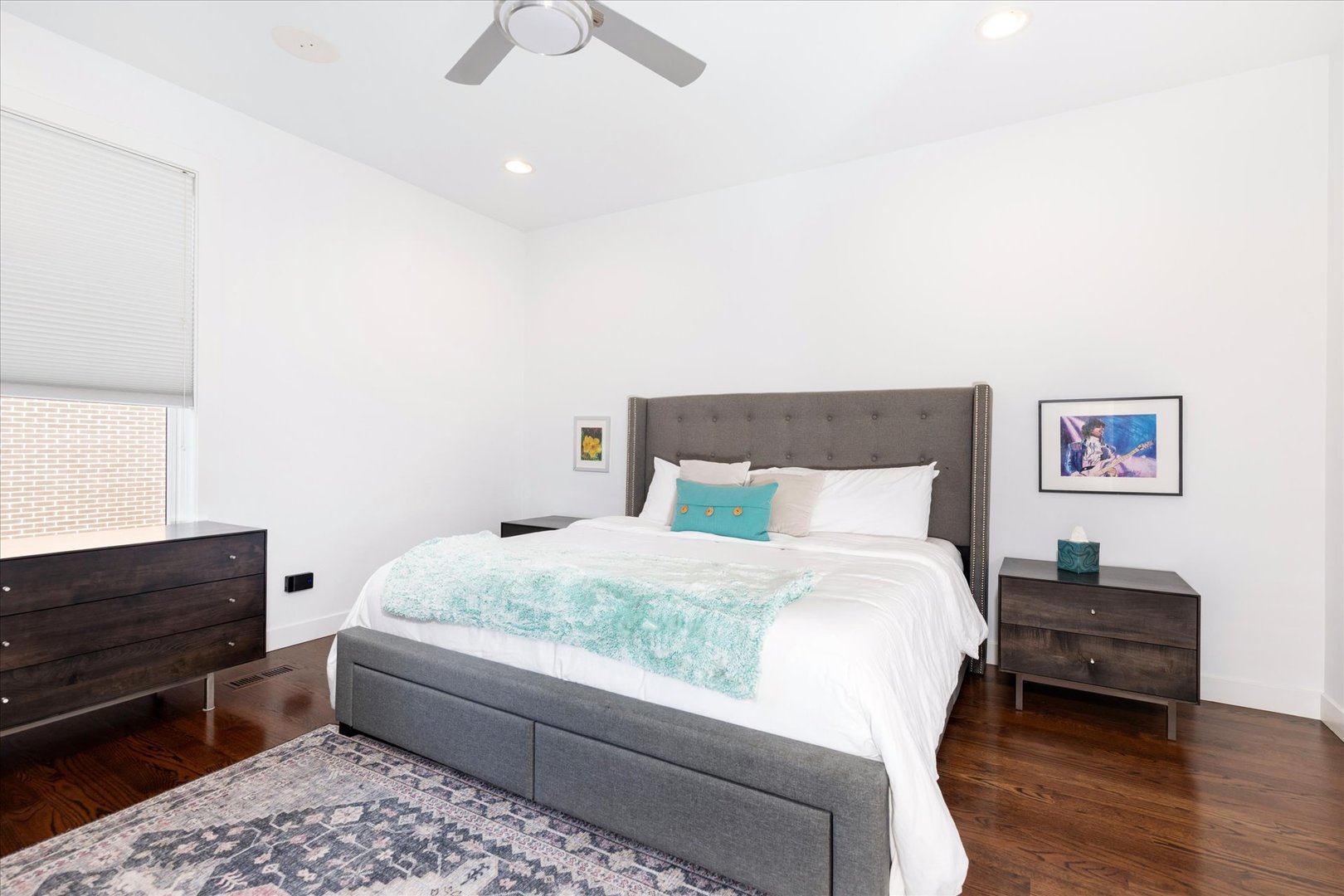 103 Home Avenue Oak Park, IL 60302 - Photo 20 of 33 a bedroom with a bed and wooden floor