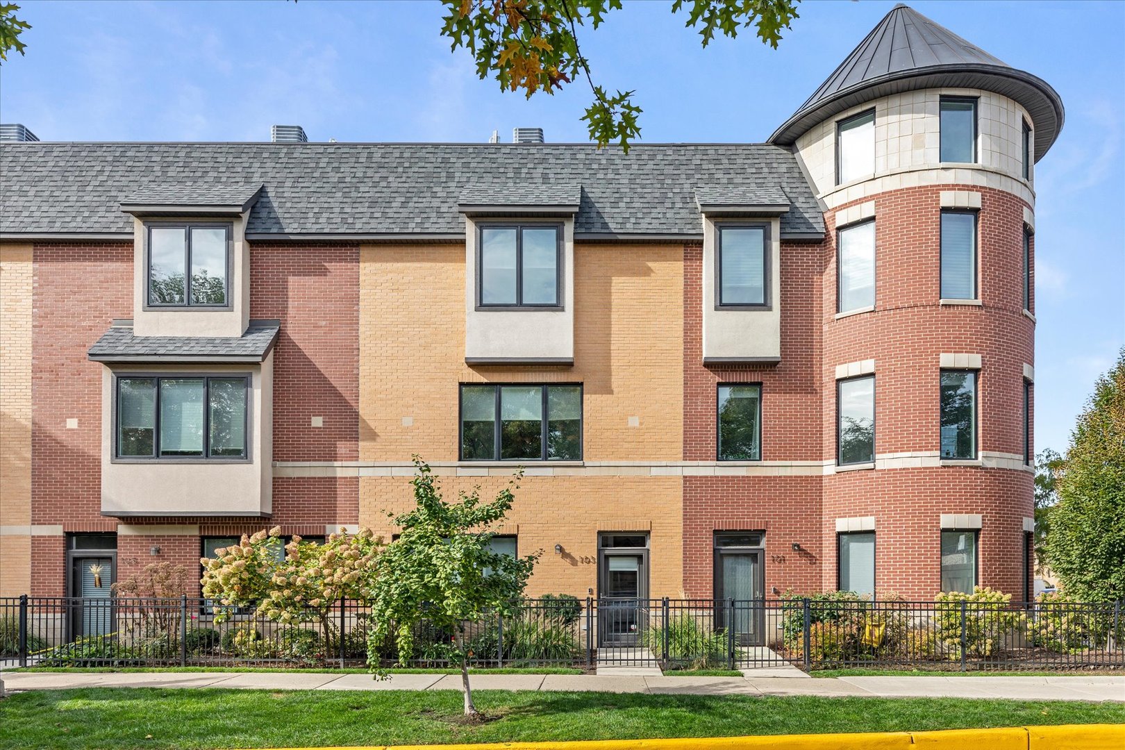 103 Home Avenue Oak Park, IL 60302 - Photo 2 of 33 a front view of residential houses with yard and green space