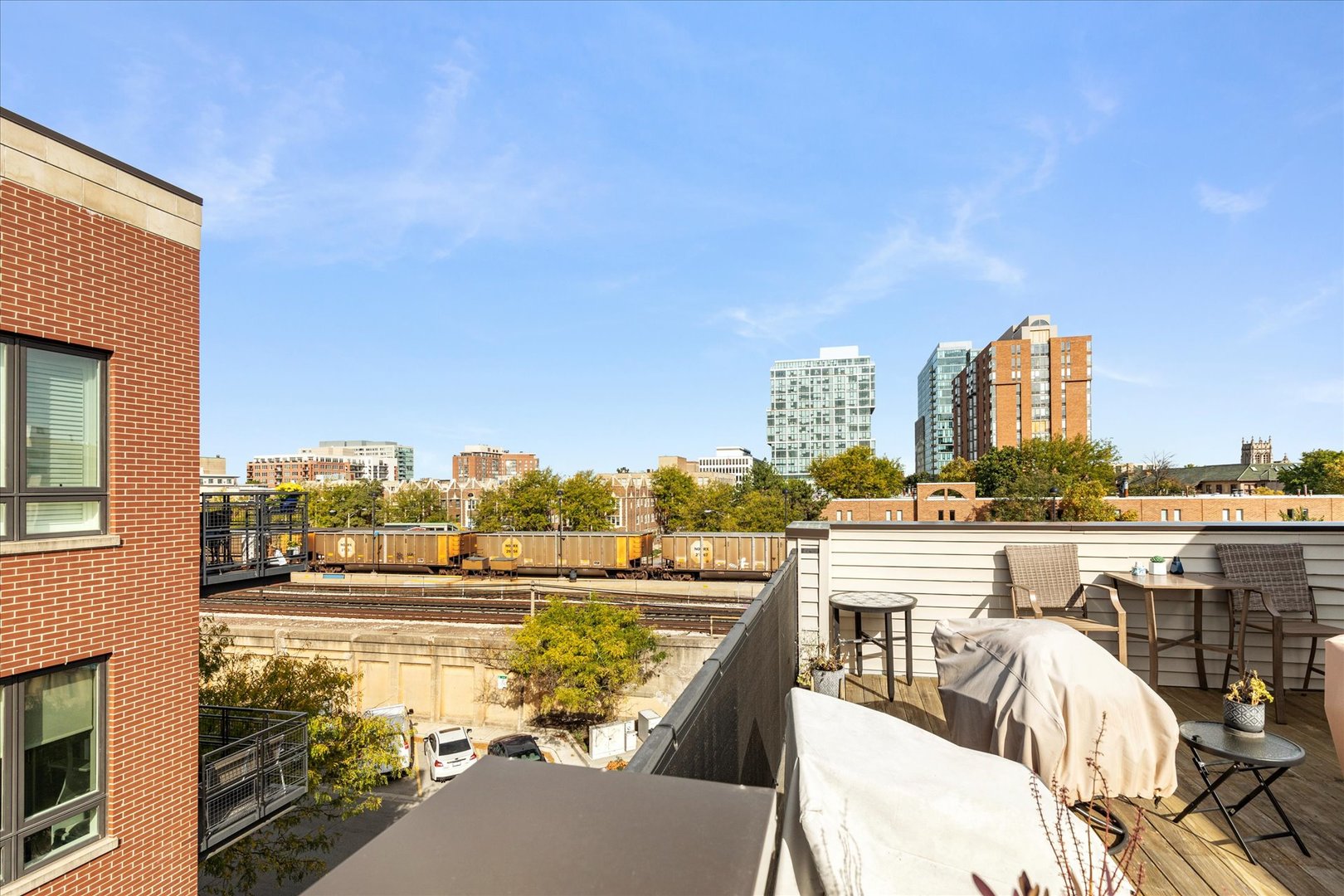 103 Home Avenue Oak Park, IL 60302 - Photo 29 of 33 a view of a city from a balcony with outdoor seating