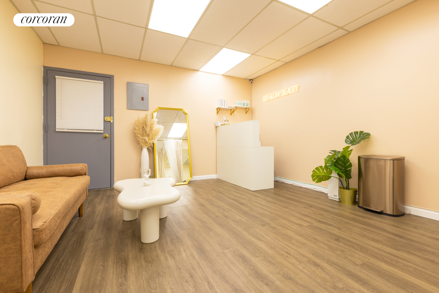 210 Canal Street, Unit 510 Manhattan, NY 10013 - Photo 2 of 6 a bathroom with a toilet and a mirror