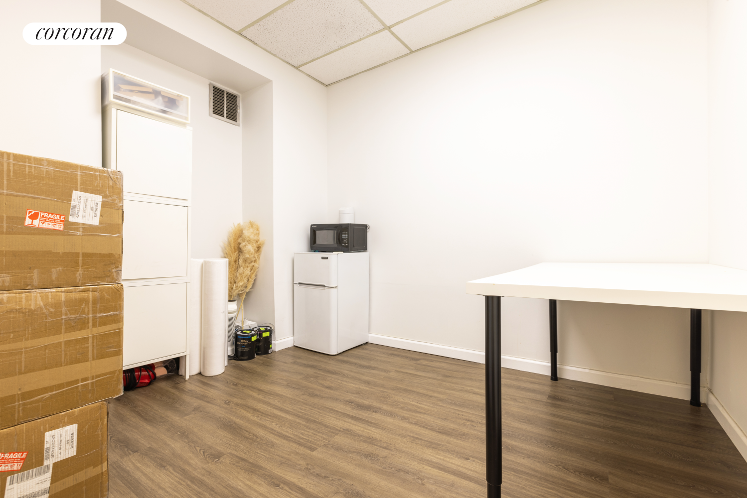 210 Canal Street, Unit 510 Manhattan, NY 10013 - Photo 4 of 6 a view of empty room with wooden floor