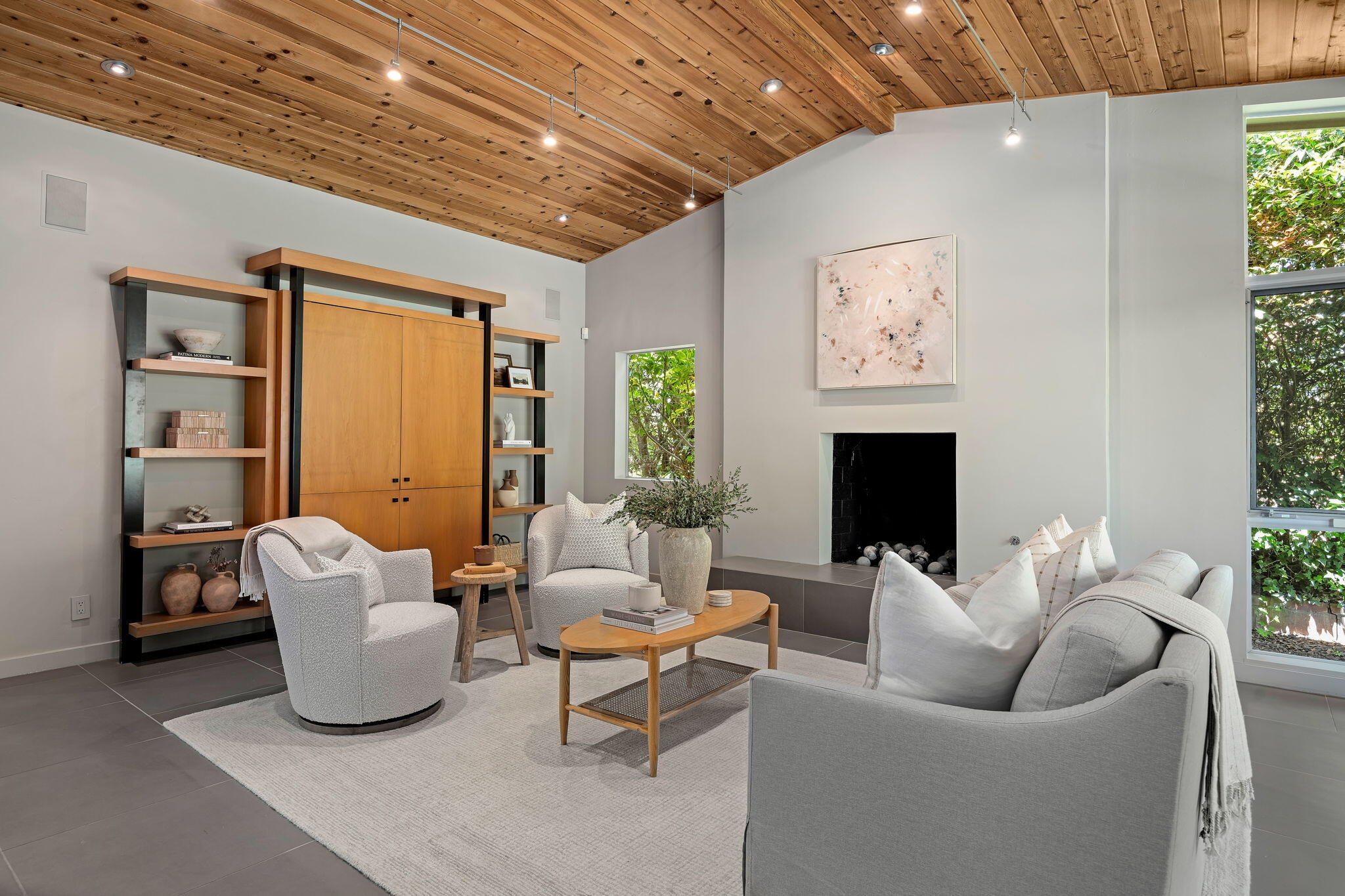 175 Hermosillo Road Montecito, CA 93108 - Photo 1 of 19 a living room with furniture and a fireplace