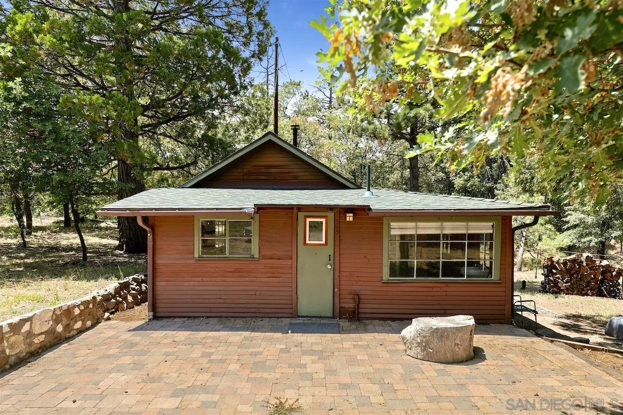 509 El Centro Terrace Mount Laguna, CA 91948 - Photo 2 of 23 a front view of a house with a yard