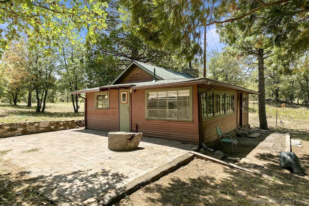 509 El Centro Terrace Mount Laguna, CA 91948 - Photo 3 of 23 a front view of a house with a yard