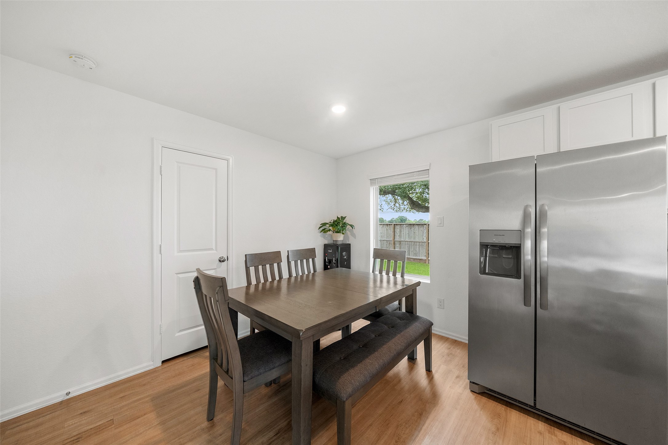 234 Bennett Street Angleton, TX 77515 - Photo 11 of 33 Breakfast/dining area with a window for a backyard view.