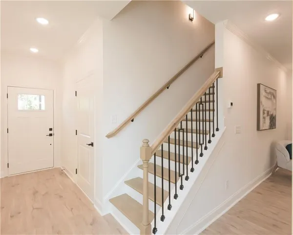 a view of a hallway with staircase