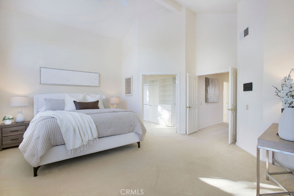 22 Callender Court Laguna Niguel, CA 92677 - Photo 28 of 67 a bedroom with a bed and closet