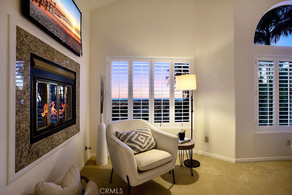 22 Callender Court Laguna Niguel, CA 92677 - Photo 51 of 67 a living room with furniture a window and a flat screen tv