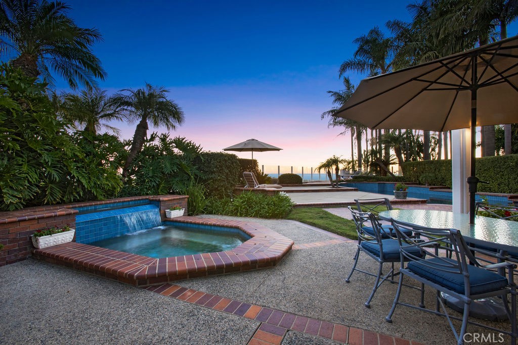 22 Callender Court Laguna Niguel, CA 92677 - Photo 52 of 67 a view of a swimming pool with a patio