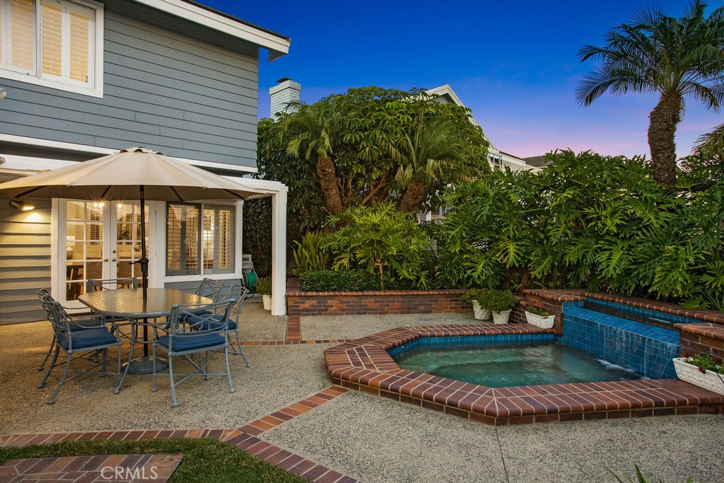 22 Callender Court Laguna Niguel, CA 92677 - Photo 53 of 67 a backyard of a house with outdoor seating