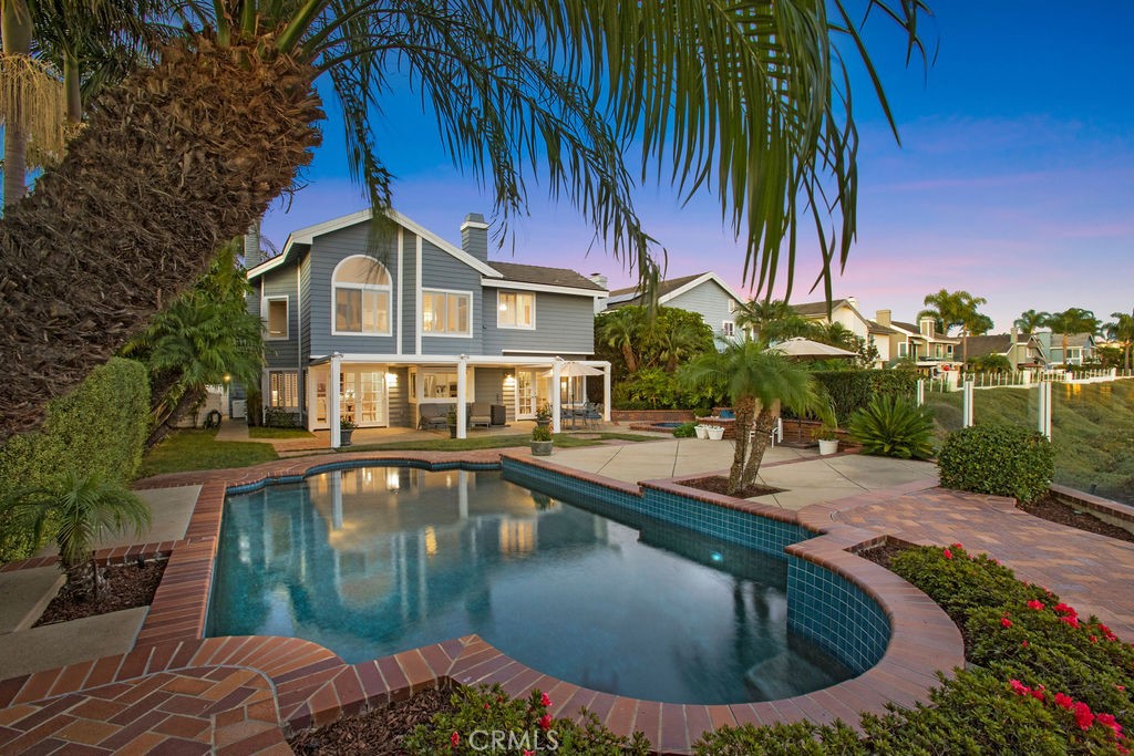 22 Callender Court Laguna Niguel, CA 92677 - Photo 55 of 67 a view of a swimming pool with a patio