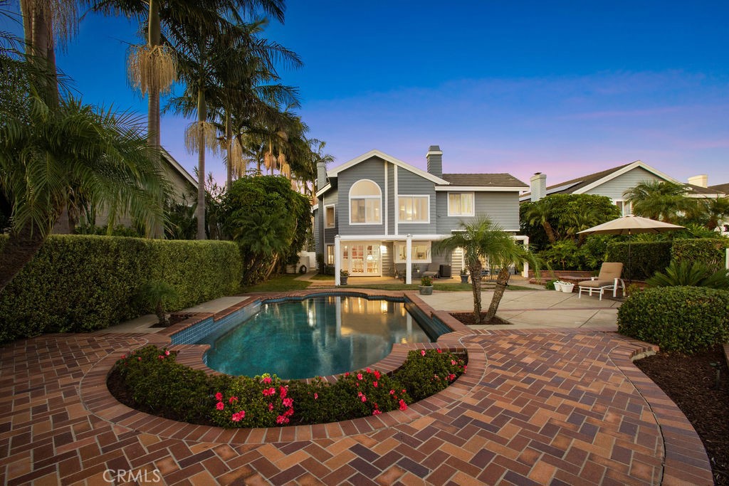 22 Callender Court Laguna Niguel, CA 92677 - Photo 56 of 67 a front view of a house with swimming pool