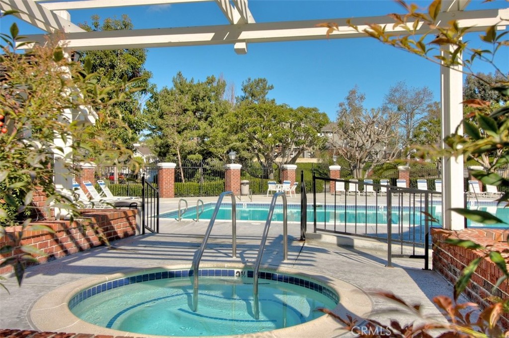 22 Callender Court Laguna Niguel, CA 92677 - Photo 64 of 67 a swimming pool with outdoor seating and yard
