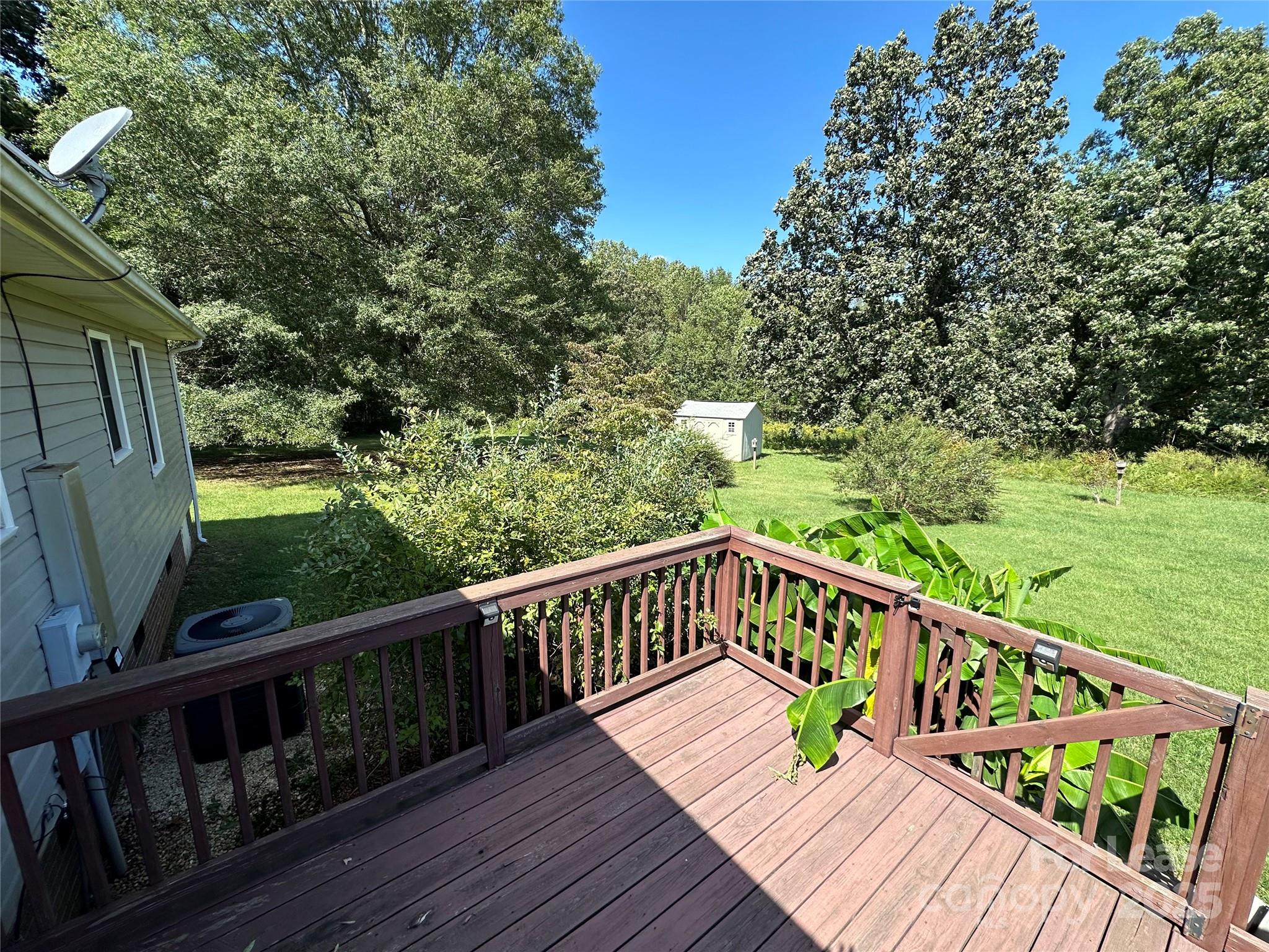 147 Sinclair Road Mooresville, NC 28115 - Photo 8 of 21 a view of balcony with wooden floor and fence