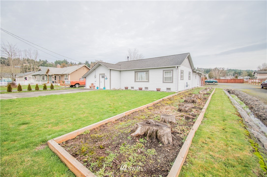 759 Southwest 20th Street Chehalis, WA 98532 - Photo 1 of 21 a view of swimming pool with a yard