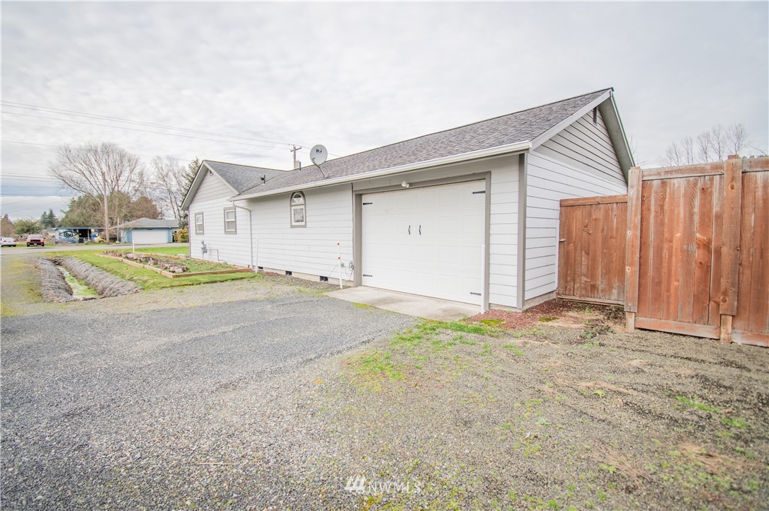 759 Southwest 20th Street Chehalis, WA 98532 - Photo 4 of 21 a view of a house with backyard and utility room