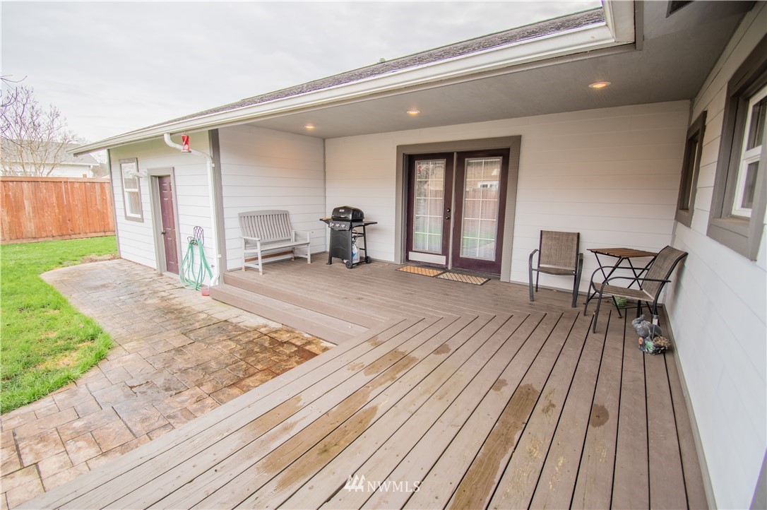 759 Southwest 20th Street Chehalis, WA 98532 - Photo 8 of 21 a view of a house with barbeque oven and furniture