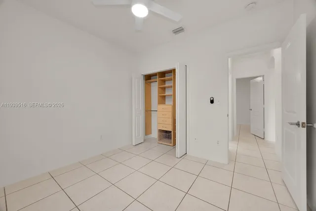 a view of an empty room and window