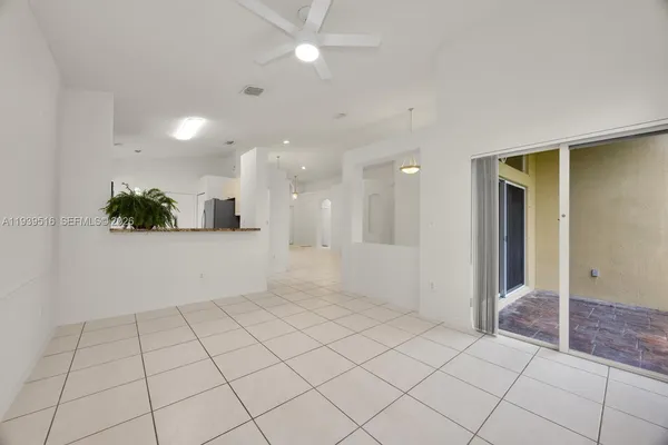 a view of an empty room and window