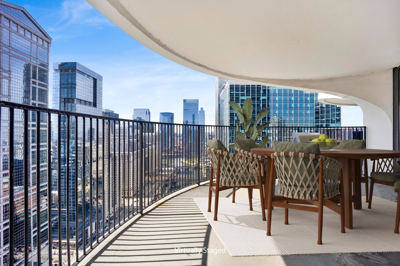 300 North State Street, Unit 4512 Chicago, IL 60654 - Photo 12 of 20 a view of a patio with a table and chairs