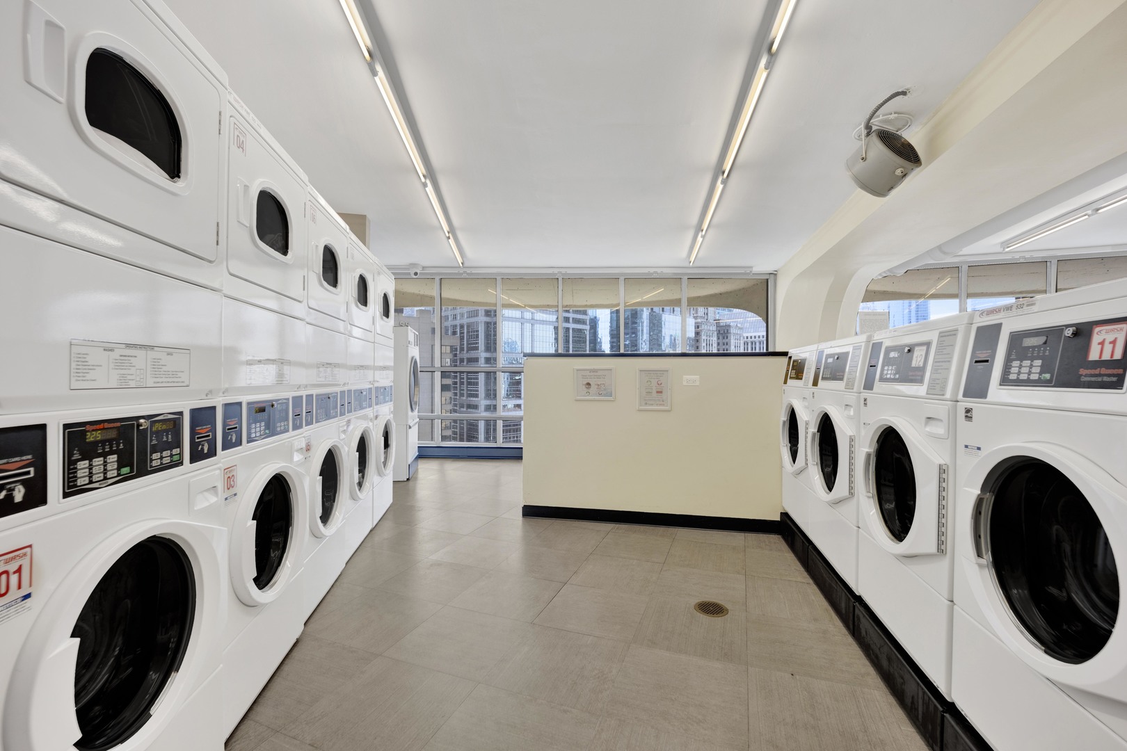 300 North State Street, Unit 4512 Chicago, IL 60654 - Photo 18 of 21 a utility room with dryer and washer