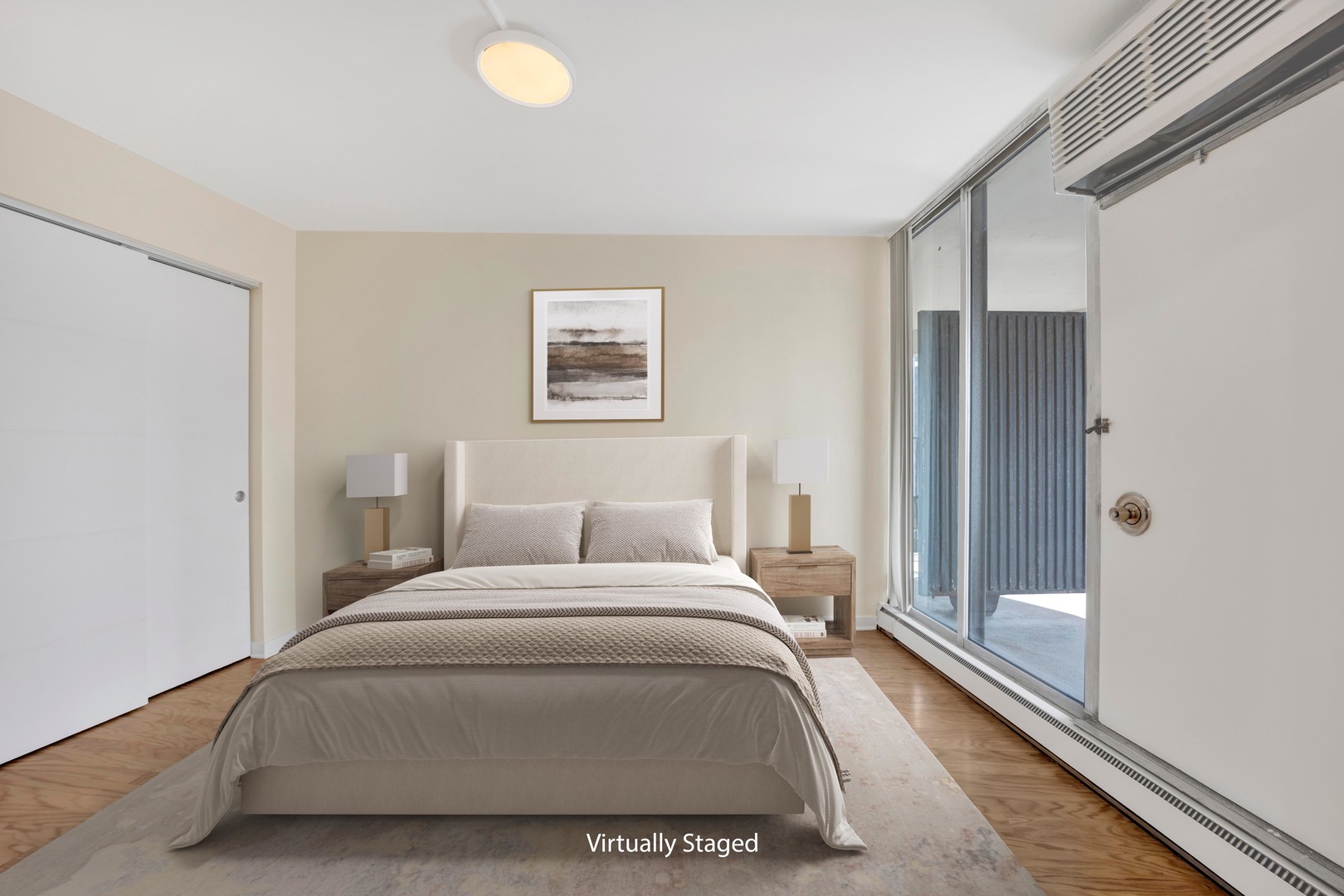 300 North State Street, Unit 4512 Chicago, IL 60654 - Photo 9 of 21 a bedroom with a bed and a large mirror