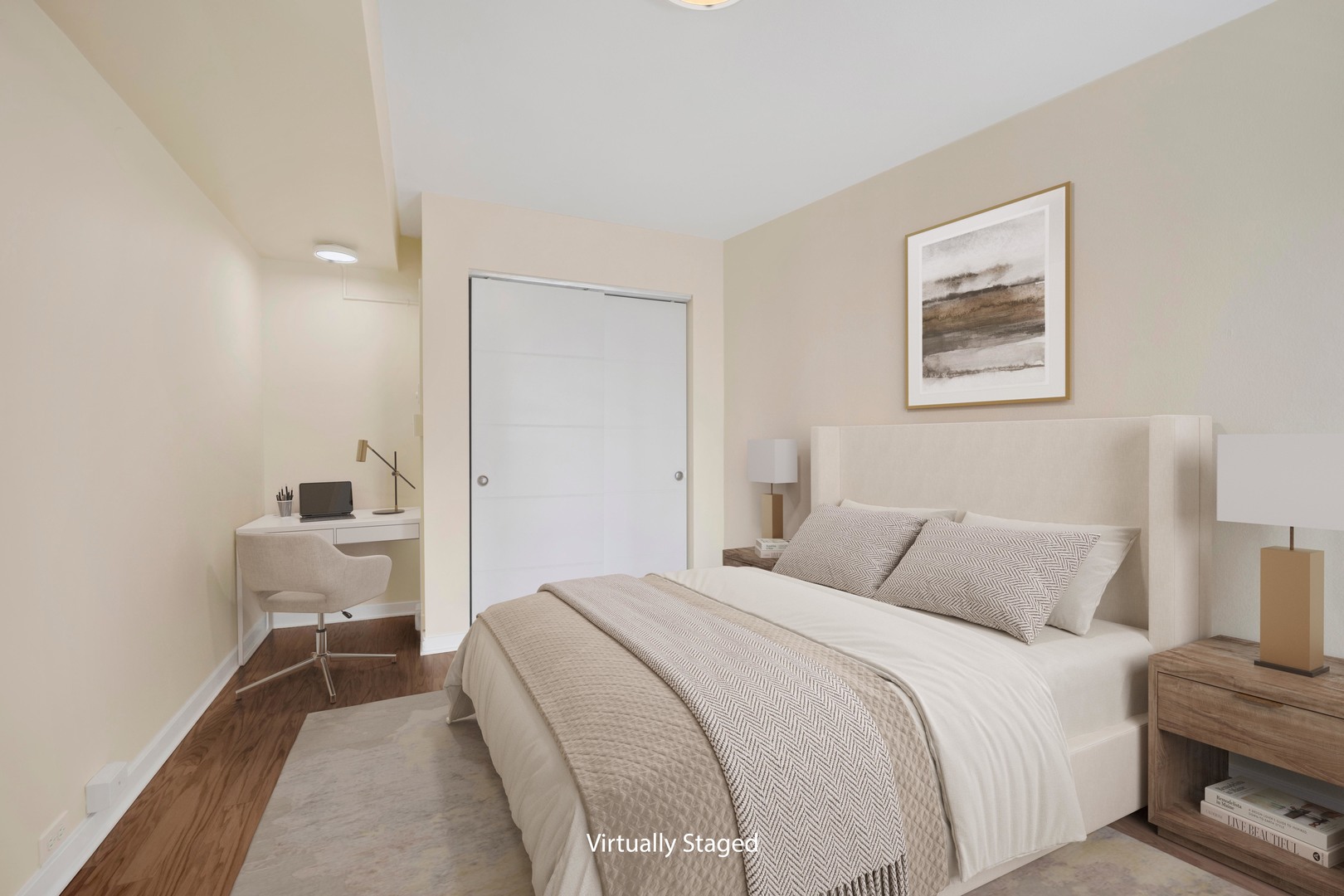 300 North State Street, Unit 4512 Chicago, IL 60654 - Photo 10 of 21 a bedroom with a bed and a lamp