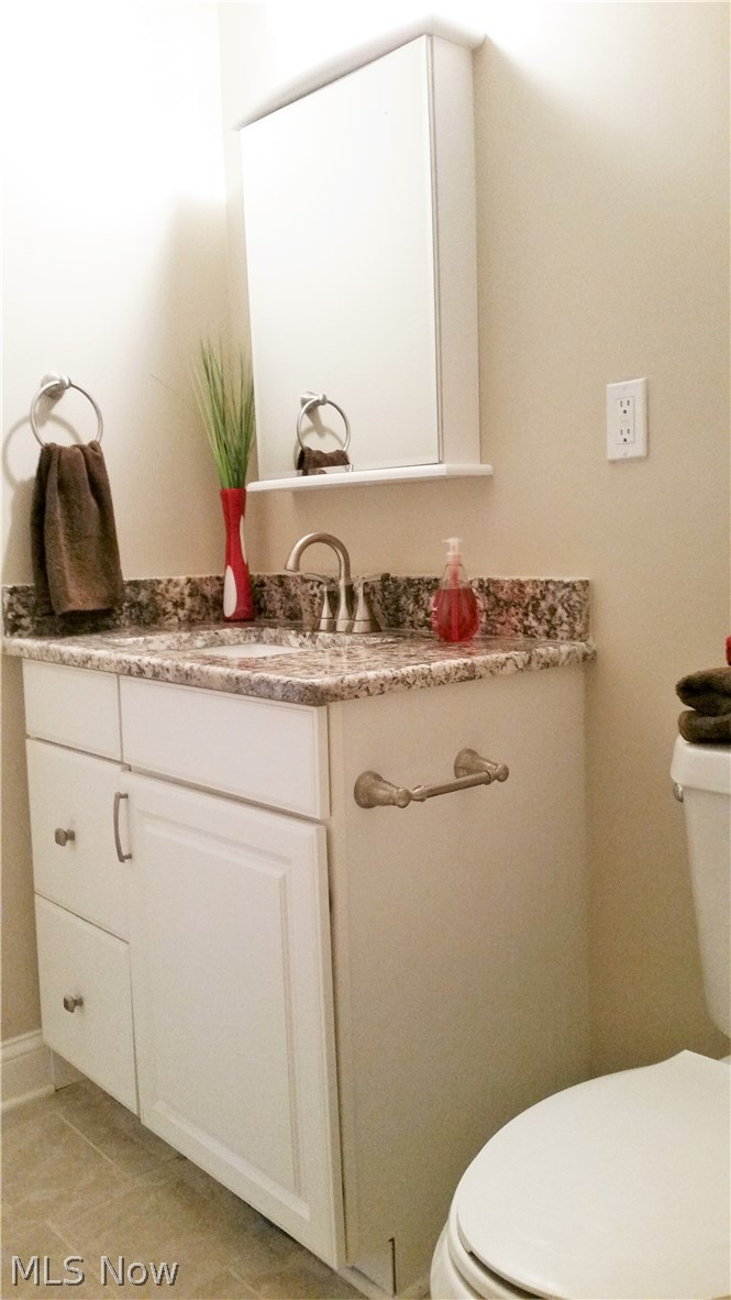 3147 Chadbourne Road Cleveland, OH 44120 - Photo 27 of 30 Hallway bathroom vanity