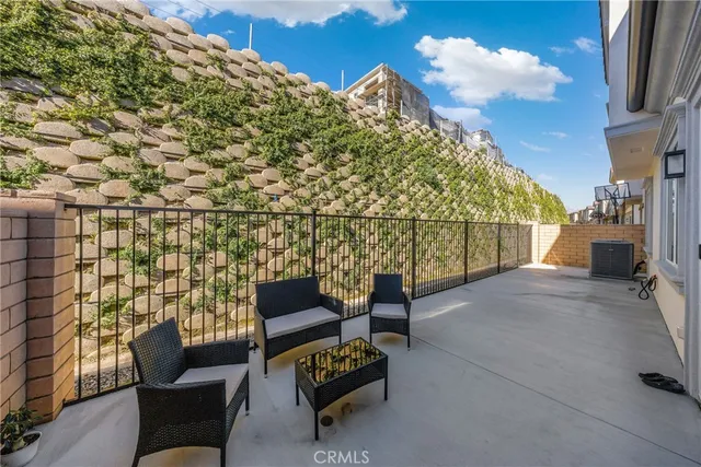 a view of patio area with seating space