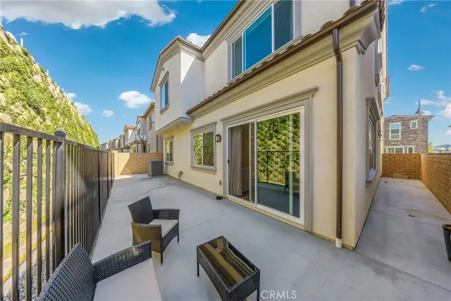a view of living room couch and windows