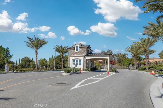 a view of multiple houses with a street