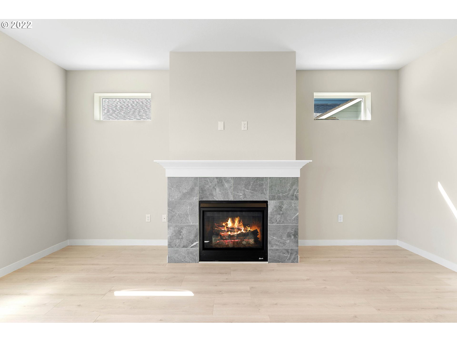 8836 North 3rd Circle Ridgefield, WA 98642 - Photo 8 of 32 a living room with a fireplace